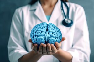 Close up image of female doctor holding brain in her hands